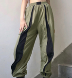 Contrasting color zipper large pockets slimming elastic band trousers women